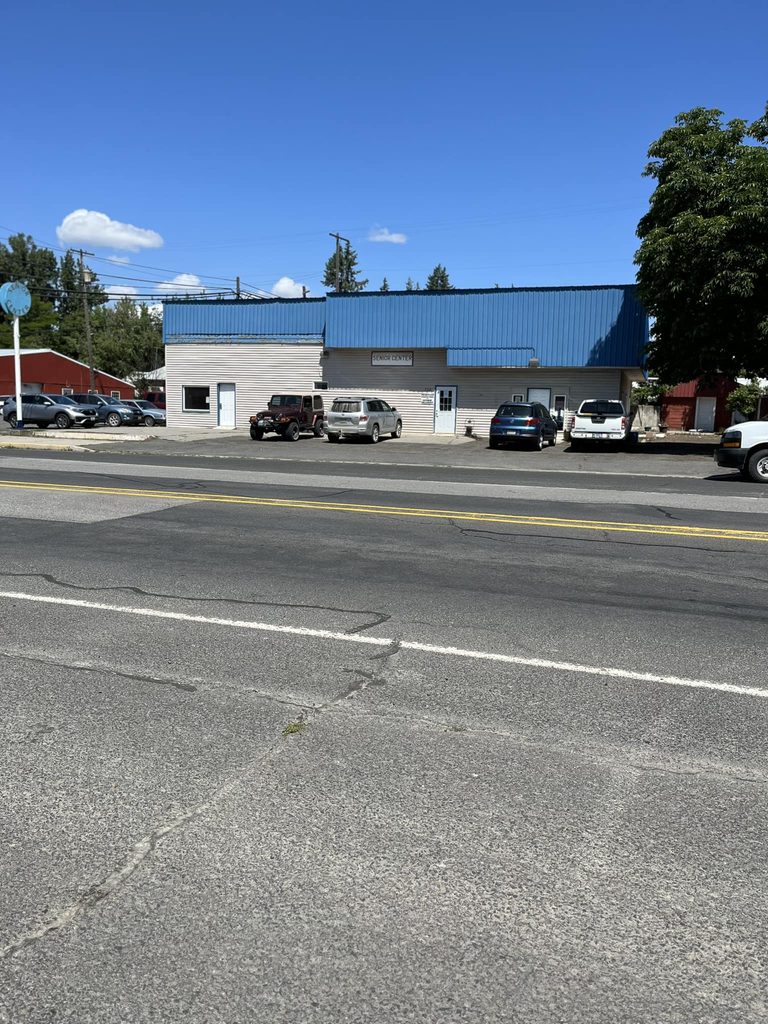 Picture taken from across the street of the building's front.